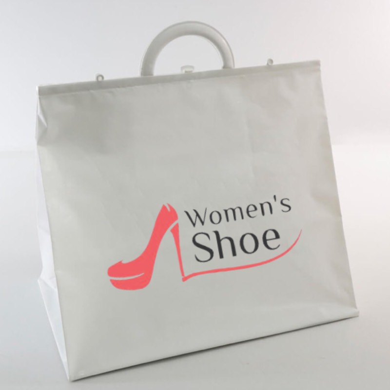 Sac plastique avec poignées rapportées